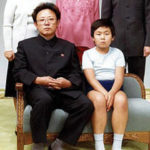North Korean Leader Kim Jong Il Bottom Left Poses With His First Born Son