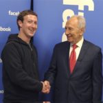 Handout photo of Israeli president Shimon Peres with Facebook CEO Mark Zuckerberg