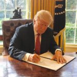 Trump_signing_Executive_Order_13780_cropped