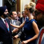 Banga speaks with Ivanka Trump as tech company leaders gather at a summit of the American Technology Council at the Eisenhower Executive Office Building in Washington