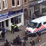 amsterdam-palestinian-flag-windows-smashing-2