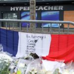 The_French_Tricolored_Flag_is_on_Display_Outside_the_Hyper_Cacher_Kosher_Market_(16291418132)